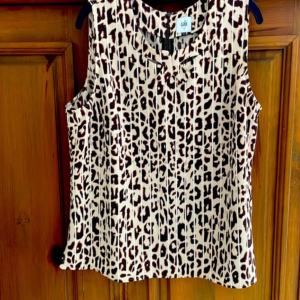 Elegant, sleeveless, never worn, leopard, print top